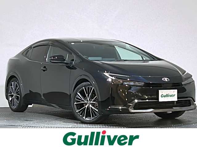トヨタ プリウス Z 愛媛県 2024(令6)年 2.1万km アティチュードブラックマイカ ・１２．３型ナビ（フルセグＴＶ・ＢＴ・ＦＭＡＭ・ＵＳＢ）/・全方位カメラ　/・ビルトインＥＴＣ２．０　/・デジタルインナーミラー　/・レーダークルーズコントロール　/・オートマチックハイビーム　/・ステアリングヒーター/・パワーバックドア/・置くだけ充電/・パーキングアシスト/・ドリンクホルダー/・シートメモリー