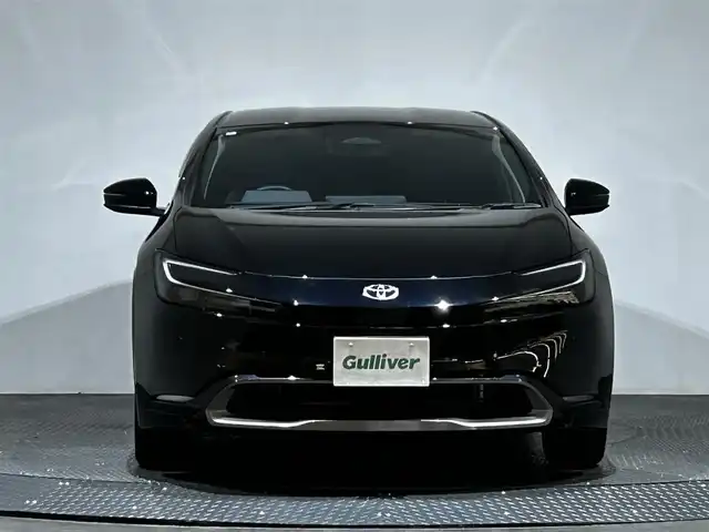 トヨタ プリウス Z 愛媛県 2024(令6)年 2.1万km アティチュードブラックマイカ ・１２．３型ナビ（フルセグＴＶ・ＢＴ・ＦＭＡＭ・ＵＳＢ）/・全方位カメラ　/・ビルトインＥＴＣ２．０　/・デジタルインナーミラー　/・レーダークルーズコントロール　/・オートマチックハイビーム　/・ステアリングヒーター/・パワーバックドア/・置くだけ充電/・パーキングアシスト/・ドリンクホルダー/・シートメモリー
