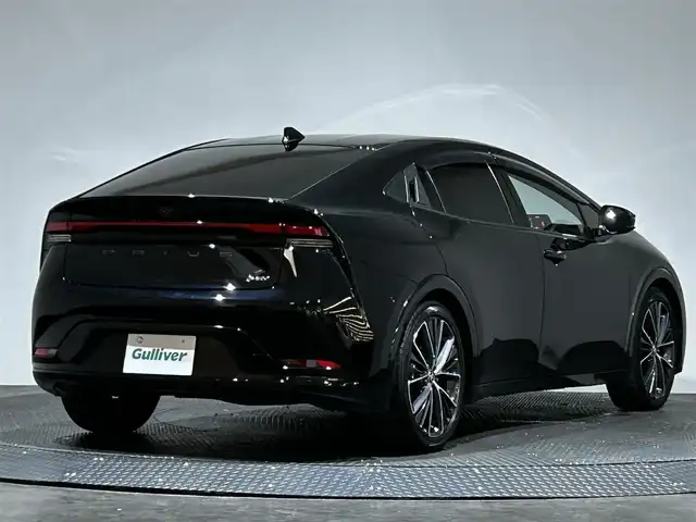 トヨタ プリウス Z 愛媛県 2024(令6)年 2.1万km アティチュードブラックマイカ ・１２．３型ナビ（フルセグＴＶ・ＢＴ・ＦＭＡＭ・ＵＳＢ）/・全方位カメラ　/・ビルトインＥＴＣ２．０　/・デジタルインナーミラー　/・レーダークルーズコントロール　/・オートマチックハイビーム　/・ステアリングヒーター/・パワーバックドア/・置くだけ充電/・パーキングアシスト/・ドリンクホルダー/・シートメモリー