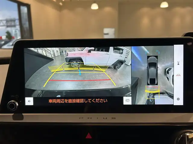 トヨタ プリウス Z 愛媛県 2024(令6)年 2.1万km アティチュードブラックマイカ ・１２．３型ナビ（フルセグＴＶ・ＢＴ・ＦＭＡＭ・ＵＳＢ）/・全方位カメラ　/・ビルトインＥＴＣ２．０　/・デジタルインナーミラー　/・レーダークルーズコントロール　/・オートマチックハイビーム　/・ステアリングヒーター/・パワーバックドア/・置くだけ充電/・パーキングアシスト/・ドリンクホルダー/・シートメモリー