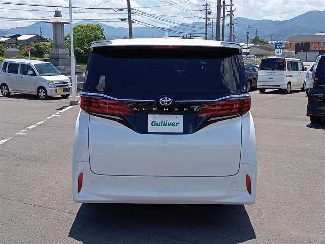 トヨタ アルファード Z 福井県 2024(令6)年 0.5万km プラチナホワイトパールマイカ 衝突被害軽減システム/純正メモリナビ/・（フルセグTV/Bluetooth）/パノラミックビューモニター/純正13.2型有機EL後席モニター/ドライブレコーダー/デジタルインナーミラー/ユニバーサルステップ/左右独立ムーンルーフ/３眼LEDヘッドライト/電動格納ウィンカーミラー/両側パワースライドドア/純正18インチAW/スマートキー