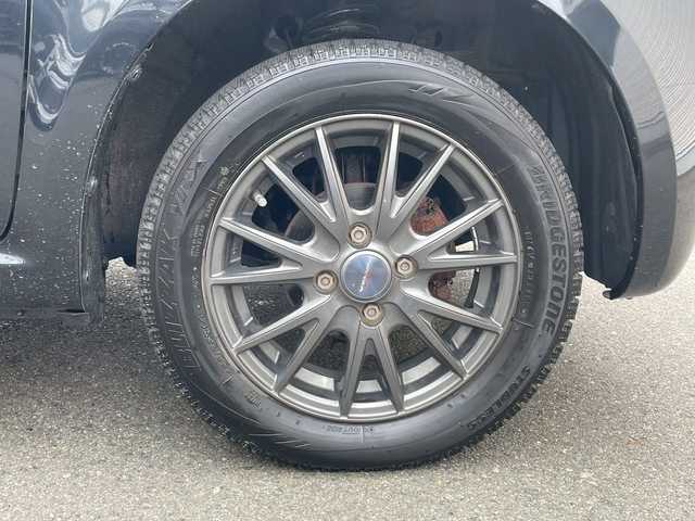 スズキ ラパン G 岩手県 2015(平27)年 8.7万km ブルーイッシュブラックパール3 アイドリングストップ/運転席シートヒーター/純正オーディオ/ドアバイザー/純正フロアマット/プッシュスタート/社外アルミホイール/電格ミラー/スマートキー/スペアキー