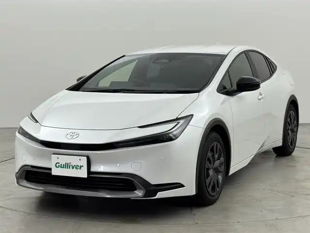 トヨタ プリウス G 福岡県 2023(令5)年 2.1万km プラチナホワイトパールマイカ 純正ＤＡ／フルセグＴＶ　/バックカメラ　/ビルトインＥＴＣ２．０　/レーダークルーズコントロール　/コーナーセンサー　/衝突被害軽減ブレーキ　/レーンキープ　/アクセル踏み間違い防止　/ＢＳＭ　/シートヒーター　/ＬＥＤ