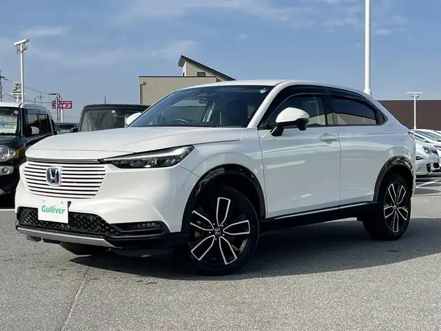 ホンダ ヴェゼル ハイブリッド e:HEV Z 奈良県 2021(令3)年 3.4万km プラチナホワイトパール 純正８インチナビ　/フルセグＴＶ/SD/USB/CD/DVD/BT/バックカメラ　/ドライブレコーダー　/ビルトインＥＴＣ　/追従型クルーズコントロール　/ハーフレザーシート（合皮）　/シートヒーター　/ホンダセンシング　/電動リアゲート　/ＢＳＭ/純正18インチアルミホイール/純正フロアマット/ステアリングヒーター/AUTOHOLD/前後コーナーセンサー