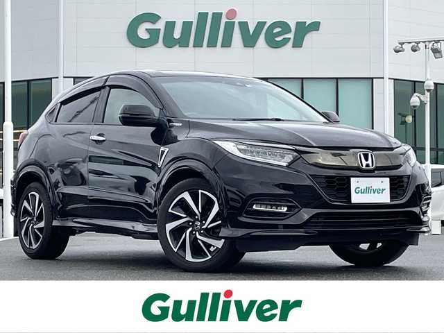 ホンダ ヴェゼル ハイブリッド RS ホンダセンシング 佐賀県 2018(平30)年 7.9万km クリスタルブラックパール 純正8インチメモリーナビゲーション/・フルセグTV/CD/DVD/SD/USB/HDMI/Bluetooth/バックカメラ/前方ドライブレコーダー/ビルトインETC/電子パーキングブレーキ/・BRAKE HOLD機能/ハーフレザーシート/DN席シートヒーター/ISOFIX対応/パドルシフト/革巻きステアリング/ステアリングリモコン/フロントデアイサ機能/純正18インチアルミホイール/純正LEDヘッドライト/純正LEDフォグランプ/純正フロアマット/純正ドアバイザ―/スペアキー１本/ホンダセンシング/・アダプティブクルーズコントロール/・衝突被害軽減ブレーキ/・先行車発進お知らせ機能/・路外逸脱抑制機能/・レーンキープアシストシステム/・リアクティブフォースペダル/・標識認識機能