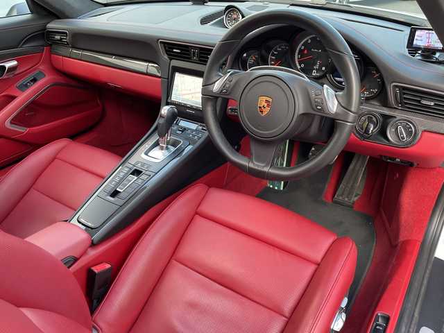 ポルシェ ９１１ ターボS 広島県 2016(平28)年 3万km キャララホワイトメタリック サンルーフ/スポーツクロノパッケージ/ポルシェ・アダプティブ・エアロダイナミクス（ＰＡＡ）/・可変フロントスポイラー/・自動調整リアウイング/ポルシェ・ダイナミック・シャシーコントロール（ＰＤＣＣ）/ポルシェ・セラミックコンポジット・ブレーキ（ＰＣＣＢ）/・イエローキャリパー/Clarionナビ（CD/DVD/フルセグTV/Bluetooth）/バックカメラ/ETC/ドライブレコーダー/赤レザーシート/・シートヒーター/・エアシート/・パワーシート/クルーズコントロール/LEDヘッドライト/純正20インチAW/ステアリングスイッチ/スペアキー