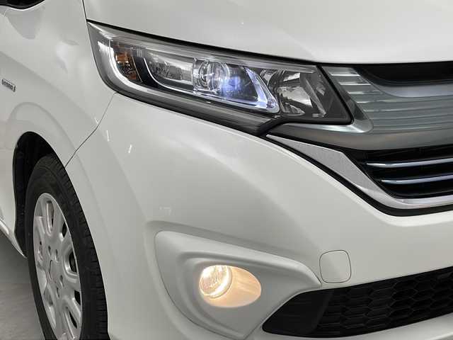 ホンダ フリード ハイブリット G ホンダセンシング 群馬県 2018(平30)年 1.6万km ホワイトオーキッドパール 純正ナビ　バックカメラ　両側電動スライドドア　ビルトインＥＴＣ　アダプティブクルーズコントロール　ＬＥＤヘッドライト　フォグランプ　オートライト　ステアリングリモコン　衝突被害軽減ブレーキ　禁煙車