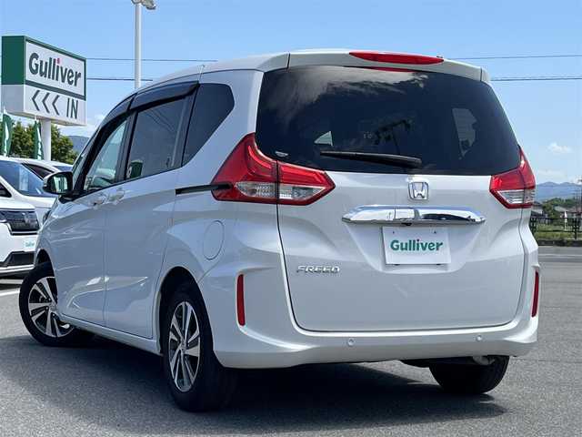 ホンダ フリード G ホンダセンシング 奈良県 2021(令3)年 2.7万km プラチナホワイトパール Ｓパッケージ　/純正ナビ　[VXM-224VFi]/(BT/DVD/CD)/バックカメラ　/ビルトインＥＴＣ　/地デジ　/レーダークルーズコントロール　/衝突被害軽減システム　/レーンキープアシスト　/両側パワースライドドア　/革巻きステアリング