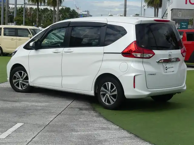 ホンダ フリード G ホンダセンシング 千葉県 2021(令3)年 2.7万km プラチナホワイトパール 185/65R15/ホンダセンシング/・衝突軽減ブレーキ（CMBS）/・車線維持支援システム（LKAS）/・アダプティブクルーズコントロール（ACC）/・後方誤発進抑制機能/・誤発進抑制機能/両側パワースライドドア/純正メモリーナビ/地デジTV/【DVD/CD再生機能　Bluetooth接続】/バックカメラ/ドライブレコーダー/ハーフレザーシート/革巻きステアリング/ETC/LEDヘッドライト/ウインカーミラー/純正15インチアルミホイル/Honda スマートキー