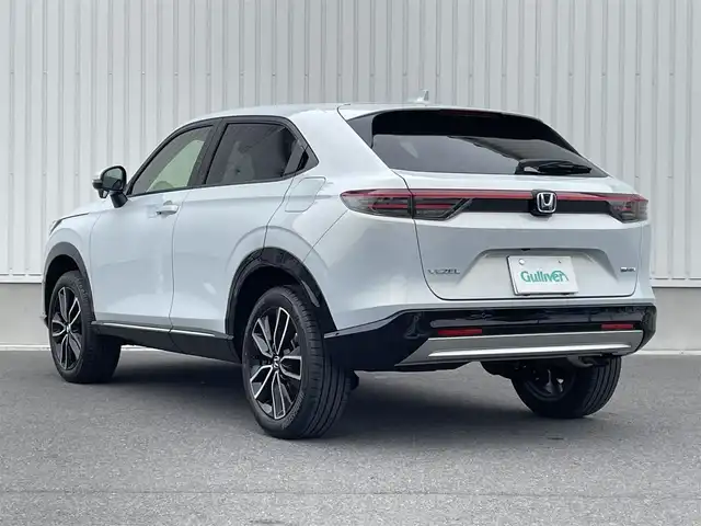 ホンダ ヴェゼル ハイブリッド e:HEV Z 群馬県 2025(令7)年 0.1万km未満 プレミアムサンライトホワイトパール ワンオーナー/純正ナビ/　(AM/FM/TV/BT/USB)/パワーバックドア/ハンズフリーアクセスパワーテールゲート/バックカメラ/ホンダセンシング/路外逸脱抑制機能/踏み間違い衝突軽減システム/衝突軽減ブレーキ/ブラインドスポットモニター/コーナーセンサー/ヒルディセントコントロール/横滑り防止機能/レーダークルーズコントロール/ETC2.0/AUTOライト/LEDヘッドライト/LEDフォグライト/前席シートヒーター/ステアリングヒーター/ステアリングリモコン/パドルシフト/置くだけ充電/シーケンシャルウィンカー/取扱説明書/保証書/スペアキー1つ