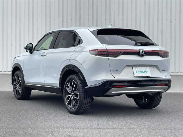 ホンダ ヴェゼル ハイブリッド e:HEV Z 群馬県 2025(令7)年 0.1万km未満 プレミアムサンライトホワイトパール ワンオーナー/純正ナビ/　(AM/FM/TV/BT/USB)/パワーバックドア/ハンズフリーアクセスパワーテールゲート/バックカメラ/ホンダセンシング/路外逸脱抑制機能/踏み間違い衝突軽減システム/衝突軽減ブレーキ/ブラインドスポットモニター/コーナーセンサー/ヒルディセントコントロール/横滑り防止機能/レーダークルーズコントロール/ETC2.0/AUTOライト/LEDヘッドライト/LEDフォグライト/前席シートヒーター/ステアリングヒーター/ステアリングリモコン/パドルシフト/置くだけ充電/シーケンシャルウィンカー/取扱説明書/保証書/スペアキー1つ