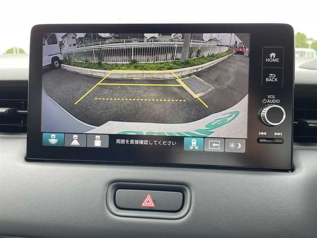 ホンダ ヴェゼル ハイブリッド e:HEV Z 群馬県 2025(令7)年 0.1万km未満 プレミアムサンライトホワイトパール ワンオーナー/純正ナビ/　(AM/FM/TV/BT/USB)/パワーバックドア/ハンズフリーアクセスパワーテールゲート/バックカメラ/ホンダセンシング/路外逸脱抑制機能/踏み間違い衝突軽減システム/衝突軽減ブレーキ/ブラインドスポットモニター/コーナーセンサー/ヒルディセントコントロール/横滑り防止機能/レーダークルーズコントロール/ETC2.0/AUTOライト/LEDヘッドライト/LEDフォグライト/前席シートヒーター/ステアリングヒーター/ステアリングリモコン/パドルシフト/置くだけ充電/シーケンシャルウィンカー/取扱説明書/保証書/スペアキー1つ