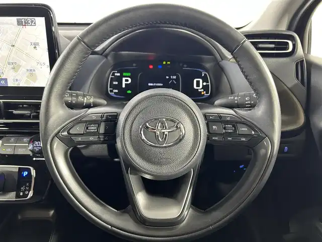 トヨタ アクア Z 佐賀県 2021(令3)年 2.1万km エモーショナルレッドⅡ 純正　10.5インチディスプレイオーディオ/（TV/AM/FM/Bluetooth/全周囲カメラ/衝突被害軽減システム/車線逸脱警報/クルーズコントロール/ハーフレザーシート/横滑り防止装置/ビルトインETC/アイドリングストップ/LEDヘッドライト/フォグランプ/オートライト/ウィンカーミラー/電動格納ミラー/純正15インチAW/シートヒーター/シートリフター/ステアリングヒーター/プッシュスタート/スマートキー/フロアマット/ドアバイザー/取扱説明書