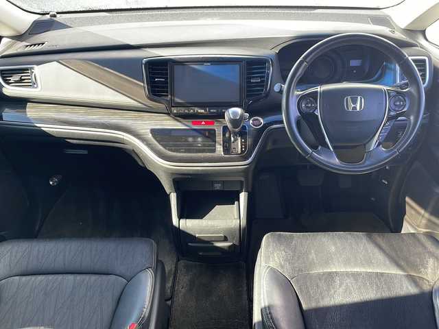 ホンダ オデッセイ アブソルート EX 三重県 2015(平27)年 10.7万km ホワイトオーキッドパール 禁煙/ALPINE9型ナビ/ALPINE後席モニター/バックカメラ/ETC/前後ドラレコ/BSM/両側パワースライドドア/レーンキープアシスト/レーダークルーズコントロール/プリクラッシュ/LEDオートライト/フォグランプ/ステアリングスイッチ/パドルシフト/電動格納ミラー