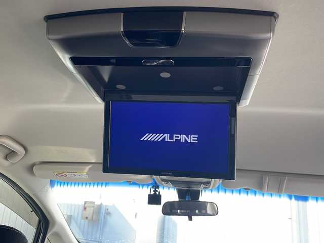 ホンダ オデッセイ アブソルート EX 三重県 2015(平27)年 10.7万km ホワイトオーキッドパール 禁煙/ALPINE9型ナビ/ALPINE後席モニター/バックカメラ/ETC/前後ドラレコ/BSM/両側パワースライドドア/レーンキープアシスト/レーダークルーズコントロール/プリクラッシュ/LEDオートライト/フォグランプ/ステアリングスイッチ/パドルシフト/電動格納ミラー