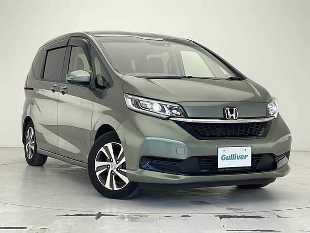 ホンダ フリード G ホンダセンシング 沖縄県 2020(令2)年 5.3万km シルバーミストグリーンM 純正ナビ（VXM-204VFi）/【フルセグTV　DVD　CD　Bluetooth　SD】/USB/ETC/バックカメラ/両側パワースライドドア/前後ドライブレコーダー/LEDヘッドライト/ハーフレザーシート/シートヒーター/レーダークルーズコントロール/スマートキー/スペアキー/社外アルミ付きスタッドレスタイヤ４本車載
