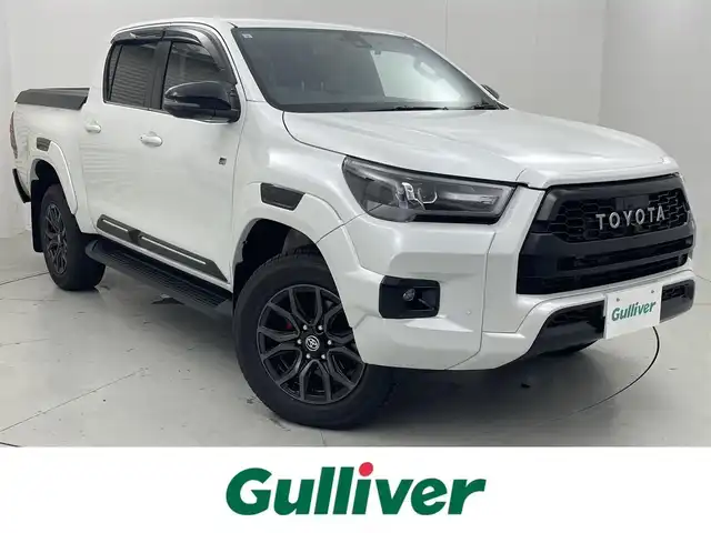 トヨタ ハイラックス Z GRスポーツ 茨城県 2024(令6)年 0.4万km プラチナホワイトパールマイカ ディスプレイオーディオ(8インチ)/ナビゲーション/Bluetooth/USB入力(動画・音楽再生/給電)/全周囲カメラ/デジタルインナーミラー/プリクラッシュセーフティ/レーンディパーチャーアラート/レーダークルーズコントロール/ロードサインアシスト/先行車発進告知機能/寒冷地仕様/・ウインドシールドデアイサー/・ヒーター付ドアミラー/・フロントヒーター/パドルシフト/LEDヘッドライト/オートライト