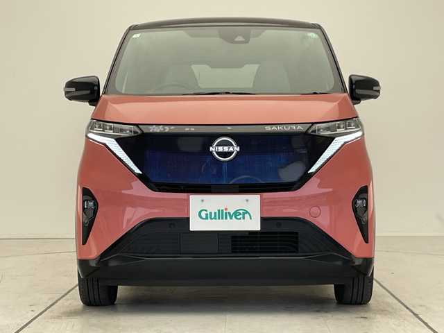 日産 サクラ G 愛知県 2024(令6)年 2.8万km ピンク プロパイロット/純正9型ディズプレイオーディオナビ/全方位カメラ/クルーズコントロール/シートヒーター/バックカメラ/コーナーセンサー/純正アルミホイール/ステアリングヒーター/LEDヘッドライト/オートマチックハイビーム/ETC/衝突軽減システム/フルセグ/Bluetooth/ステアリングスイッチ/スマートキー/プッシュスタート