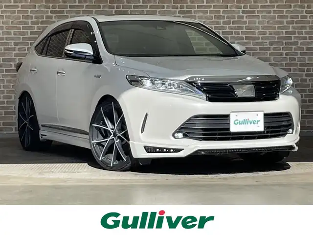 トヨタ ハリアー ハイブリッド プレミアム 岩手県 2018(平30)年 6.9万km ホワイトパールクリスタルシャイン ワンオーナー/４WD/ムーンルーフ/プリクラッシュセーフティ/レーダークルーズコントロール/レーンディパーチャーアラート/オートマチックハイビーム/MTモード付AT/横滑り防止装置/オートブレーキホールド/パワーバックドア/運転席パワーシート/アイドリングストップ/社外ナビ/フルセグTV/Msスピードエアロ/LEDヘッドランプ/２２インチアルミホイール/車高調