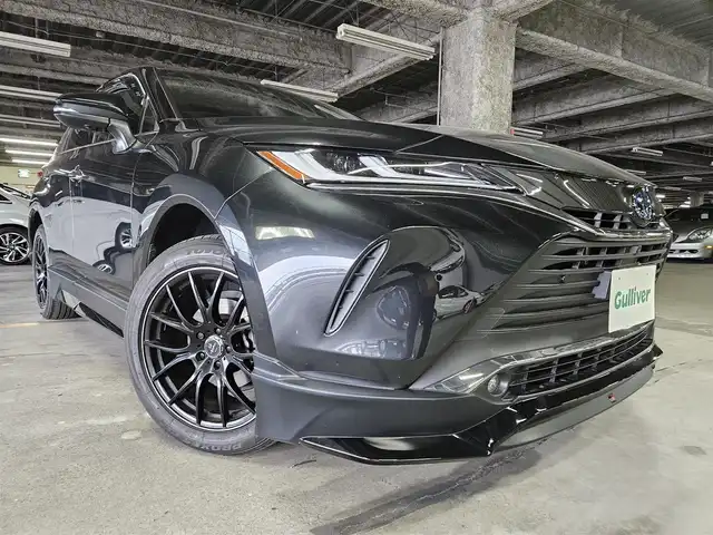 トヨタ ハリアー ハイブリッド Z レザーパッケージ 長崎県 2021(令3)年 8.3万km プレシャスブラックパール 〇ワンオーナー/〇純正12.3インチナビ/〇フルセグTV/〇バックカメラ/〇パノラマモニター/〇ビルトインETC2.0/〇JBLプレミアムサウンド/〇GRエアロ（フロント/サイド/リアアンダー）/〇セーフティセンス/〇レーダークルーズコントロール/〇プリクラッシュセーフティ/〇ブラインドスポットモニター/〇パワーバックドア/〇LEDヘッドランプ/〇オートライト/〇フォグランプ/〇社外19インチアルミ/〇革巻きステアリング/〇オートエアコン/〇革シート/〇シートヒーター/シートベンチレーション/〇パワーシート/〇スマートエントリー/〇禁煙車