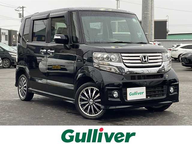 ホンダ Ｎ ＢＯＸ カスタム G ターボSSパッケージ 道北・旭川 2013(平25)年 7.7万km クリスタルブラックパール 4WD/純正メモリナビ/ CD/SD/USB/1セグ/バックカメラ/クルーズコントロール/横滑り防止/パドルシフト/両側パワースライドドア /エンジンスターター /ETC/プッシュスタート /オートライト/HIDヘッドライト/フォグライト/ミラーヒーター /純正フロアマット/ドアバイザー