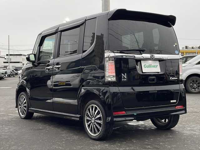 ホンダ Ｎ ＢＯＸ カスタム G ターボSSパッケージ 道北・旭川 2013(平25)年 7.7万km クリスタルブラックパール 4WD/純正メモリナビ/ CD/SD/USB/1セグ/バックカメラ/クルーズコントロール/横滑り防止/パドルシフト/両側パワースライドドア /エンジンスターター /ETC/プッシュスタート /オートライト/HIDヘッドライト/フォグライト/ミラーヒーター /純正フロアマット/ドアバイザー