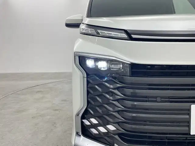 トヨタ ヴォクシー ハイブリッド S－Z 群馬県 2024(令6)年 1.2万km ホワイトパールクリスタルシャイン 純正１０．５型ナビ　バックカメラ　ＣＤ／ＤＶＤ　プロジェクター型３眼ＬＥＤライト　アダプティブクルーズコントロール　衝突被害軽減ブレーキ　両側電動スライドドア　シートヒーター　純正ＥＴＣ２．０　禁煙車