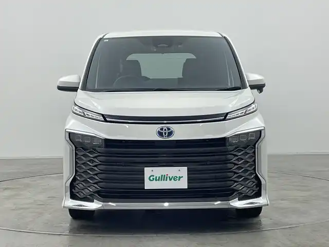 トヨタ ヴォクシー ハイブリッド S－Z 群馬県 2024(令6)年 1.2万km ホワイトパールクリスタルシャイン 純正１０．５型ナビ　バックカメラ　ＣＤ／ＤＶＤ　プロジェクター型３眼ＬＥＤライト　アダプティブクルーズコントロール　衝突被害軽減ブレーキ　両側電動スライドドア　シートヒーター　純正ＥＴＣ２．０　禁煙車