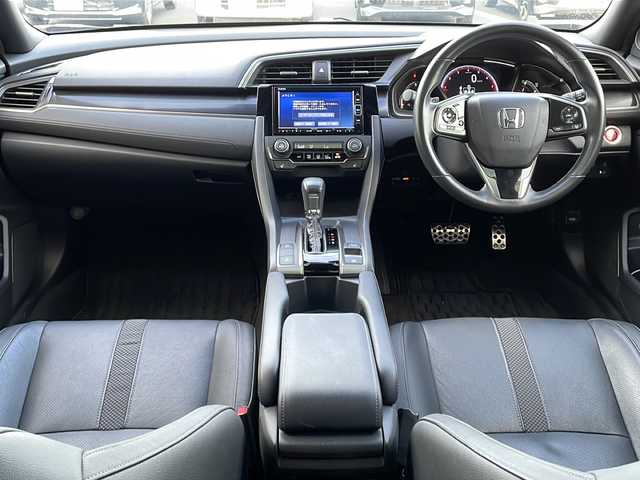ホンダ シビック ハッチバック 栃木県 2020(令2)年 2.3万km ソニックグレーパール ワンオーナー/純正SDナビ/Bluetooth CD DVD/TV フルセグ/バックカメラ/トップロードサンルーフ/純正リアルルーフスポイラー/ステンレス製スポーツペダル/ETC2.0/純正前後ドライブレコーダー/レザーシート/シートヒーター/パワーシート/レザーインテリア/純正18インチアルミホイール/Honda SENSING/LEDヘッドライト/衝突被害軽減システム/保証書/記録簿/取扱説明書