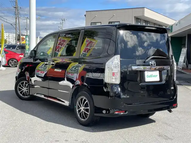 トヨタ ヴォクシー ZS 煌Ⅱ 長野県 2012(平24)年 15.6万km ブラック ワンオーナー/社外HDDナビ/・Bluetooth/CD/DVD/ワンセグTV/ビルトインETC/3列シート/ドライブレコーダー前方のみ/純正フロアマット/布系シート/両側パワースライドドア/社外16インチAW/キセノンオートライト/フォグランプ/Wエアバック/クルーズコントロール追従無し/パドルシフト/スマートキー/スペアキー1本/冷房WAC