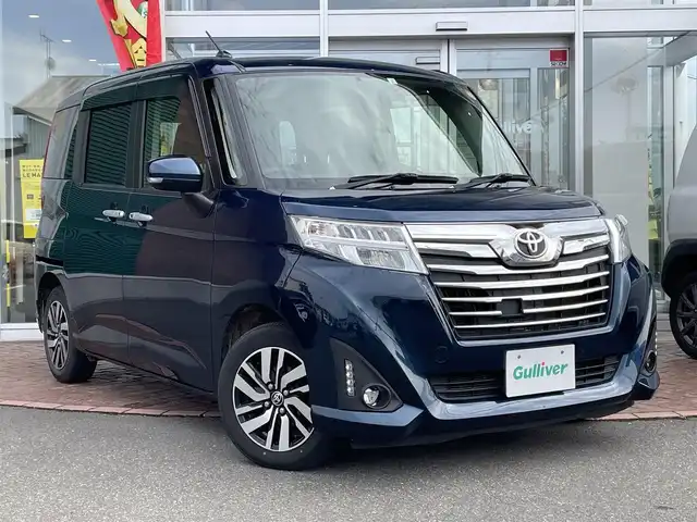 トヨタ ルーミー カスタムG 道央・札幌 2017(平29)年 10.3万km レーザーブルークリスタルシャイン ４WD/ワンオーナー/純正SDナビ(AM/FM/CD/SD/BT)/ワンセグ(走行中視聴不可)/バックカメラ/アイドリングストップ/ウィンカーミラー/ドアバイザー/プッシュスタート/両側パワースライドドア/ビルトインETC/横滑り防止装置/盗難防止装置/オートライト/フォグランプ/革巻きステアリング/ステアリングスイッチ/後席ロールサンシェード/純正エンジンスターター/スペアキー×１