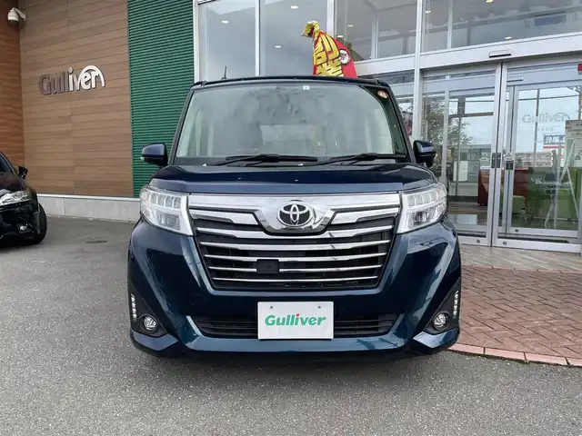 トヨタ ルーミー カスタムG 道央・札幌 2017(平29)年 10.3万km レーザーブルークリスタルシャイン ４WD/ワンオーナー/純正SDナビ(AM/FM/CD/SD/BT)/ワンセグ(走行中視聴不可)/バックカメラ/アイドリングストップ/ウィンカーミラー/ドアバイザー/プッシュスタート/両側パワースライドドア/ビルトインETC/横滑り防止装置/盗難防止装置/オートライト/フォグランプ/革巻きステアリング/ステアリングスイッチ/後席ロールサンシェード/純正エンジンスターター/スペアキー×１