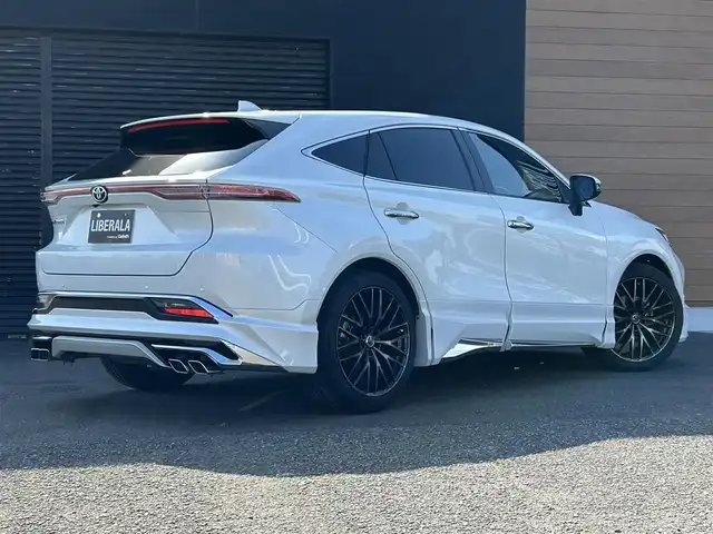 トヨタ ハリアー Z レザーパッケージ 宮崎県 2023(令5)年 3万km プラチナホワイトパールマイカ JBLディスプレイオーディオナビ/・フルセグTV/・AM/・FM/・Bluetooth/JBLサウンド/モデリスタエアロ/全方位カメラ/トヨタセーフティーセンス/コーナーセンサー/電動リアゲート/レーダークルーズコントロール/LEDライト/社外アルミホイール20インチ/ETC2.0/ブラインドスポットモニター/USBポート/ドラレコ(前)/パワーシート/レザーシート/オートホールド/電動ランバーサポート/ハンドルヒーター/シートベンチレーション/シートヒーター/デジタルインナーミラー