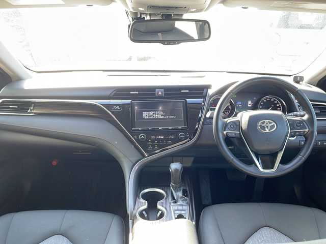 トヨタ カムリ G 兵庫県 2017(平29)年 6.2万km スティールブロンドM 純正ナビ（AM/FM/BT)/・フルセグTV/追従付きクルーズコントロール/レーンアシスト/車両接近通報装置/オートライト/横滑り防止/スポーツモード/エコモード/EVモード