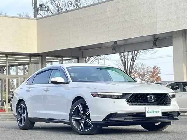 ホンダ アコード e:HEV 宮城県 2025(令7)年 0.3万km プラチナホワイトパール ホンダセンシング　360＋/Google搭載 12.3インチHonda CONNECTディスプレー/ＢＯＳＥプレミアムサウンド/３６０度アラウンドビューカメラ/フルセグＴＶ/ＡＭ／ＦＭ／Ｂｌｕｅｔｏｏｔｈ／前後席ＵＳＢ/レーダークルーズコントロール/ヘッドアップディスプレイ/レーンキープアシスト/ブラインドスポットモニター/衝突被害軽減ブレーキ/LEDアンビエントライト/全席シートヒーター/ハンドルヒーター/ワイヤレス充電器/リアドアサンシェード/純正フロアマット/ビルトインETC2.0/スマートキーx2