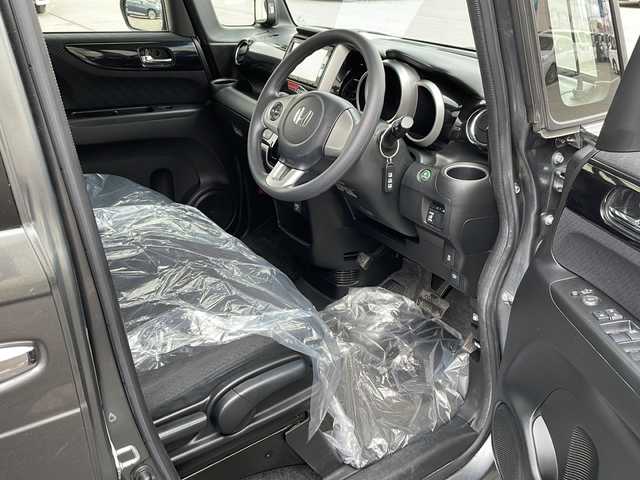 ホンダ Ｎ ＢＯＸ カスタム G Aパッケージ 道北・旭川 2015(平27)年 8.1万km ポリッシュドメタルメタリック 4WD/純正メモリナビ/ CD/DVD/SD/1セグ/バックカメラ/CTBA/左パワースライドドア /横滑り防止/オートライト/HIDヘッドライト/フォグライト/プッシュスタート /ミラーヒーター /純正フロアマット/ドアバイザー
