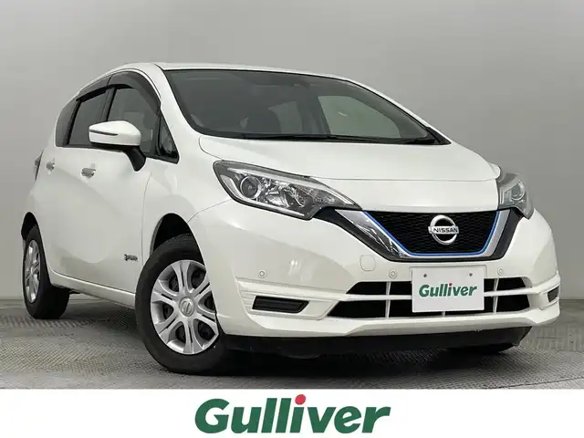 日産 ノート e－パワー B FOUR 道央・札幌 2019(令1)年 2.2万km ホワイト ・4WD/・寒冷地仕様/・社外ＳＤナビ/・Bluetooth/FM/AM/・バックカメラ/・衝突軽減防止/・レーンキープアシスト/・クリアランスソナー/・アイドリングストップ/・横滑り防止装置/・ＥＴＣ/・オートライト/・ＨＩＤヘッドライト/・スマートキー/・スペアキー/・プッシュスタート/・社外フロアマット/・保証書/・取扱説明書