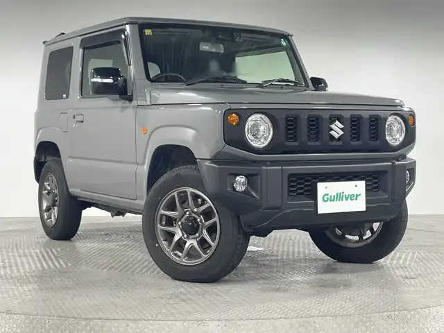 スズキ ジムニー XC 神奈川県 2020(令2)年 3.7万km ミディアムグレー 純正7型SDナビゲーション【CN-RZ765W】/AM FM Bluetooth フルセグ SD CD DVD USB/バックカメラ/セーフティサポート/デュアルセンサーブレーキサポート/誤発進抑制機能/車線逸脱警報機能/ふらつき警報/先行車発進お知らせ機能/標識認識機能/クルーズコントロール/ダウンヒルアシストコントロール/ビルトインETC/ステアリングリモコン/前方ドライブレコーダー/前席シートヒーター/純正フロアマット/純正16インチアルミホイル/LEDヘッドライト/オートライト/オートマチックハイビーム/フォグランプ