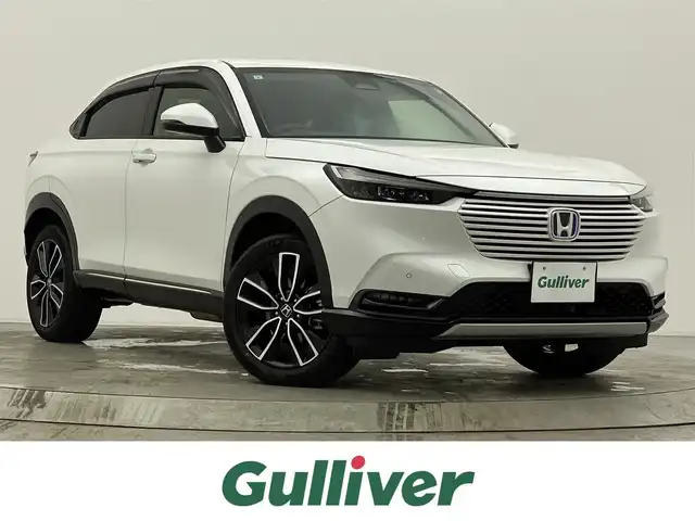 ホンダ ヴェゼル ハイブリッド e:HEV Z 宮城県 2021(令3)年 5.5万km プラチナホワイトパール 純正ナビ　/アダプティブクルーズコントロール　/衝突軽減ブレーキ　/路外逸脱抑制　/ブラインドスポットインフォメーション　/誤発信抑制/電動パーキングブレーキ/オートホールド/パワーバックドア　/ワイヤレス充電　/シートヒーター /ETC/前後ドライブレコーダー/バックモニター/LEDヘッドライト/純正18インチAW/センターコンソールイルミネーション /フルセグTV/CD/DVD/Bluetooth/禁煙車