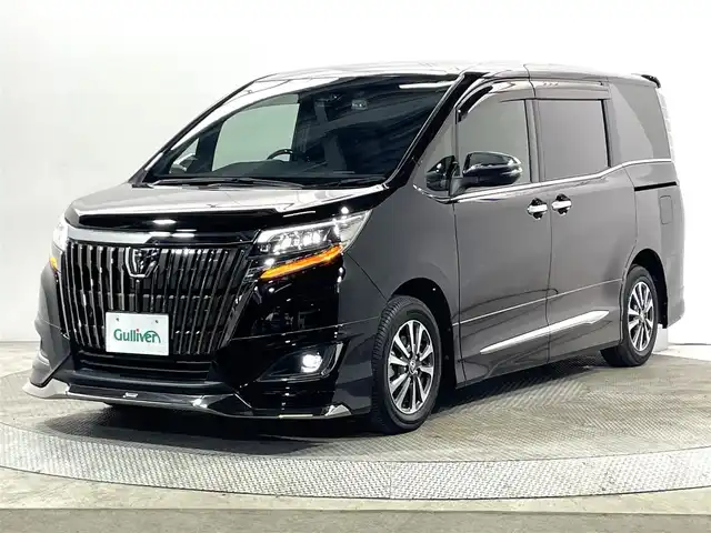 トヨタ エスクァイア Gi プレミアムパッケージ ブラックテーラード 大阪府 2019(令1)年 1.2万km ブラック モデリスタエアロ 純正10incナビTV バックカメラ ハーフレザー シートヒーター クルーズコントロール 衝突軽減ブレーキ レーンアシスト オートハイビーム 両側パワースライドドア ドライブレコーダー ワンオーナー