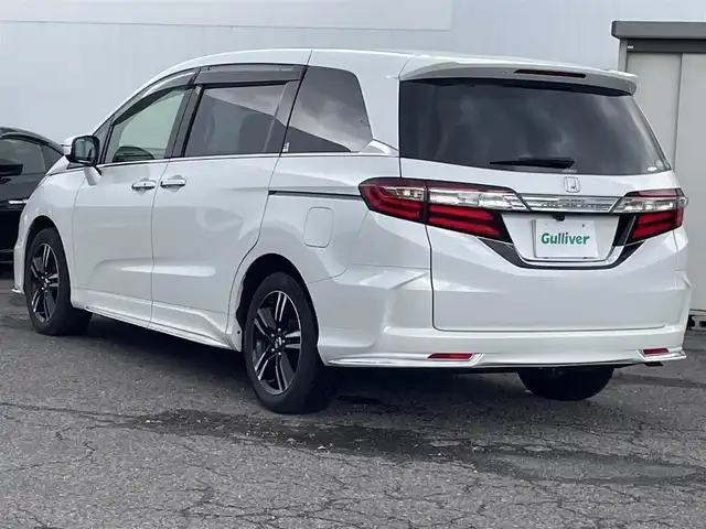 ホンダ オデッセイ アブソルート 福島県 2015(平27)年 8.7万km ホワイトオーキッドパール ４ＷＤ/純正ナビ/フルセグＴＶ/ＣＤ/ＤＶＤ/ＦＭ・ＡＭ/Ｂｌｕｅｔｏｏｔｈ/バックカメラ/片側パワスラ/レーンアシスト/衝突軽減ブレーキ/クルーズコントロール/社外センターコンソール/ＥＴＣ/純正フロアマット/ハーフレザーシート