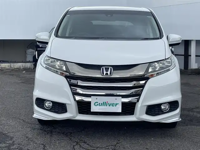 ホンダ オデッセイ アブソルート 福島県 2015(平27)年 8.7万km ホワイトオーキッドパール ４ＷＤ/純正ナビ/フルセグＴＶ/ＣＤ/ＤＶＤ/ＦＭ・ＡＭ/Ｂｌｕｅｔｏｏｔｈ/バックカメラ/片側パワスラ/レーンアシスト/衝突軽減ブレーキ/クルーズコントロール/社外センターコンソール/ＥＴＣ/純正フロアマット/ハーフレザーシート