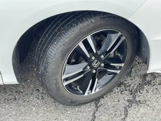 ホンダ オデッセイ アブソルート 福島県 2015(平27)年 8.7万km ホワイトオーキッドパール ４ＷＤ/純正ナビ/フルセグＴＶ/ＣＤ/ＤＶＤ/ＦＭ・ＡＭ/Ｂｌｕｅｔｏｏｔｈ/バックカメラ/片側パワスラ/レーンアシスト/衝突軽減ブレーキ/クルーズコントロール/社外センターコンソール/ＥＴＣ/純正フロアマット/ハーフレザーシート