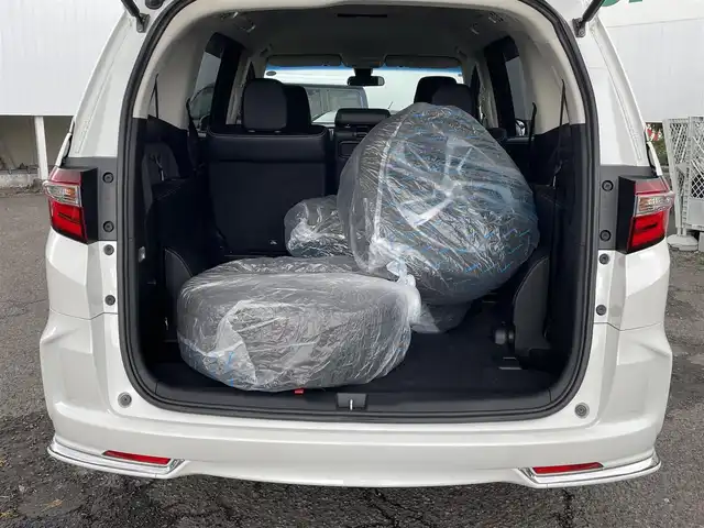 ホンダ オデッセイ アブソルート 福島県 2015(平27)年 8.7万km ホワイトオーキッドパール ４ＷＤ/純正ナビ/フルセグＴＶ/ＣＤ/ＤＶＤ/ＦＭ・ＡＭ/Ｂｌｕｅｔｏｏｔｈ/バックカメラ/片側パワスラ/レーンアシスト/衝突軽減ブレーキ/クルーズコントロール/社外センターコンソール/ＥＴＣ/純正フロアマット/ハーフレザーシート