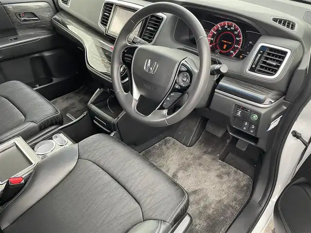 ホンダ オデッセイ アブソルート 福島県 2015(平27)年 8.7万km ホワイトオーキッドパール ４ＷＤ/純正ナビ/フルセグＴＶ/ＣＤ/ＤＶＤ/ＦＭ・ＡＭ/Ｂｌｕｅｔｏｏｔｈ/バックカメラ/片側パワスラ/レーンアシスト/衝突軽減ブレーキ/クルーズコントロール/社外センターコンソール/ＥＴＣ/純正フロアマット/ハーフレザーシート