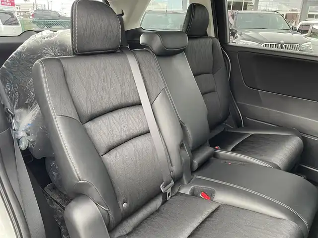 ホンダ オデッセイ アブソルート 福島県 2015(平27)年 8.7万km ホワイトオーキッドパール ４ＷＤ/純正ナビ/フルセグＴＶ/ＣＤ/ＤＶＤ/ＦＭ・ＡＭ/Ｂｌｕｅｔｏｏｔｈ/バックカメラ/片側パワスラ/レーンアシスト/衝突軽減ブレーキ/クルーズコントロール/社外センターコンソール/ＥＴＣ/純正フロアマット/ハーフレザーシート