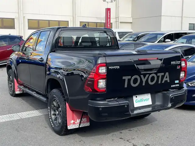 トヨタ ハイラックス Z GRスポーツ 群馬県 2022(令4)年 6.4万km アティチュードブラックマイカ 純正8インチナビ/全周囲カメラ/衝突軽減ブレーキ/レーンディパーチャーアラート/アクティブトラクションコントロール/レーダークルーズコントロール/ETC2.0/ドライブレコーダー/パドルシフト/ハーフレザーシート/パワーシート（運転席）/左右独立温度調整機能付オートエアコン/JAOS17インチアルミ/JAOSマッドガード/社外トノカバー