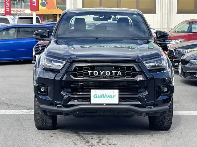 トヨタ ハイラックス Z GRスポーツ 群馬県 2022(令4)年 6.4万km アティチュードブラックマイカ 純正8インチナビ/全周囲カメラ/衝突軽減ブレーキ/レーンディパーチャーアラート/アクティブトラクションコントロール/レーダークルーズコントロール/ETC2.0/ドライブレコーダー/パドルシフト/ハーフレザーシート/パワーシート（運転席）/左右独立温度調整機能付オートエアコン/JAOS17インチアルミ/JAOSマッドガード/社外トノカバー