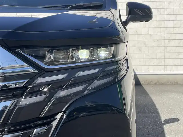 トヨタ アルファードハイブリット Z 福岡県 2024(令6)年 0.4万km ブラック 純正14型ディスプレイオーディオナビ(フルセグTV/BT)トヨタセーフティオールアラウンドビューブラインドスポット後席フリップダウンモニターWムーンルーフ両側パワスラクルコンデジタルインナーミラードラレコETC2.0シートヒーターエアシートハンドルヒーターUSBHDMI三眼LED純正アルミホイール純正フロアマットスマートキープッシュスタートスペアキー