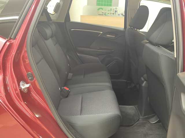 ホンダ フィット 13G L ホンダセンシング 道央・札幌 2019(令1)年 1.9万km ルージュアメジストM ・4WD/・純正ナビ/フルセグTV/DVD/CD/SD/BT/・バックカメラ/・ドライブレコーダー/・ホンダセンシング/・CMBS/・アダプティブクルーズコントロール/・先行車発進お知らせ/・路外逸脱抑制システム/・レーンキープアシスト/・標識認識機能/・アイドリングストップ/・横滑り防止/・ワイパーデアイサー/・ビルトインETC/・LEDヘッドライト/・LEDフォグ/・プッシュスタート/・スマートキー/・ドアバイザー/・電格ミラー/・ミラーヒーター/・夏タイヤ純正15インチAW積込